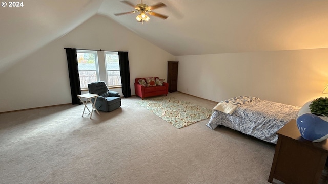 carpeted bedroom with vaulted ceiling and ceiling fan