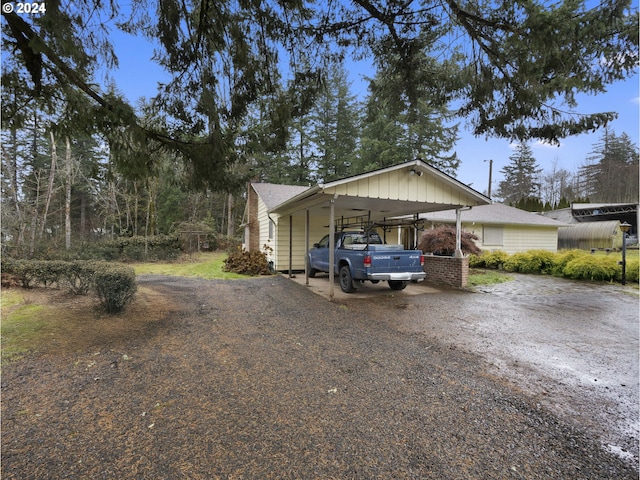 exterior space featuring a carport