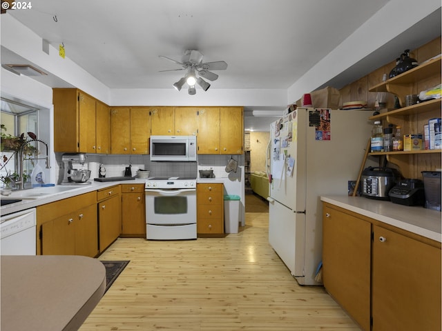 15600 SE Orient Dr, Boring, OR 97009 - kitchen with white appliances, a ceiling fan, light countertops, light wood-type flooring, and backsplash