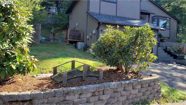 view of yard with central AC