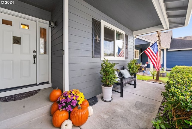 entrance to property with a porch