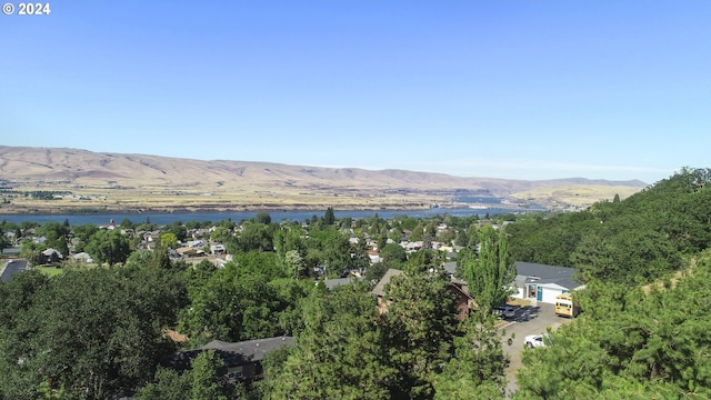 view of mountain feature with a water view