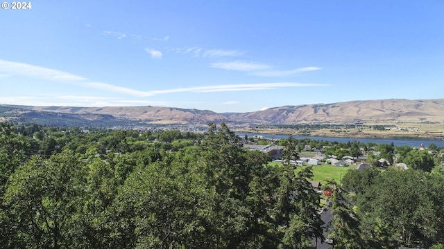 view of mountain feature featuring a water view