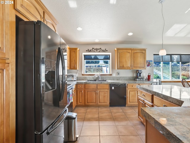 kitchen with light tile patterned flooring, sink, a textured ceiling, stainless steel fridge with ice dispenser, and dishwasher