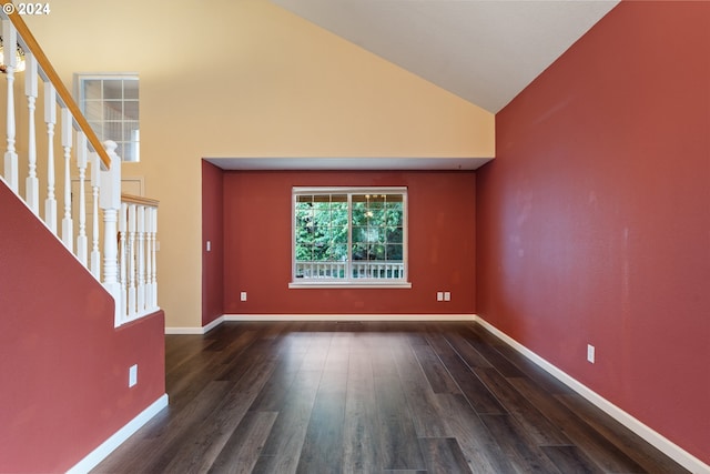 interior space featuring dark hardwood / wood-style floors and high vaulted ceiling