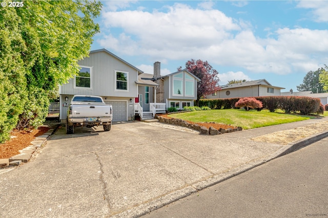 1504 SW 24th St, Troutdale, OR 97060 - view of front facade with an attached garage, driveway, and a front yard