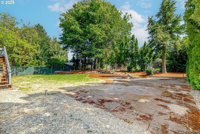1504 SW 24th St, Troutdale, OR 97060 - view of yard featuring stairway, a patio, and view of scattered trees