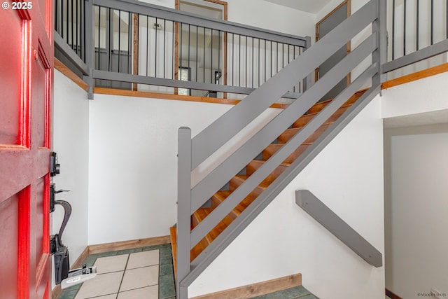 1504 SW 24th St, Troutdale, OR 97060 - entrance foyer featuring baseboards, tile patterned floors, and stairs