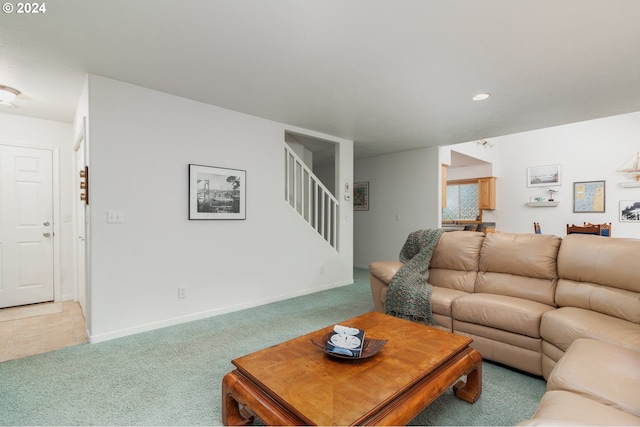 living room featuring light colored carpet