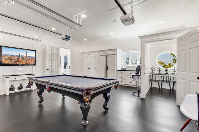 rec room featuring a textured ceiling and pool table