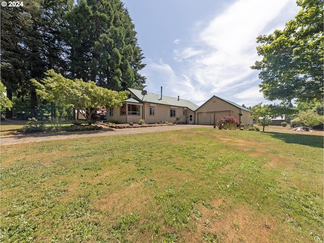 view of yard with a garage