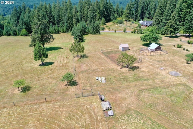 birds eye view of property featuring a rural view