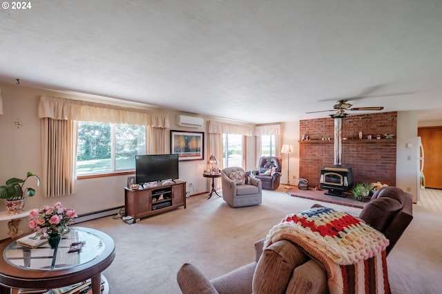 living room with a wood stove, ceiling fan, a baseboard radiator, a wall mounted air conditioner, and light colored carpet