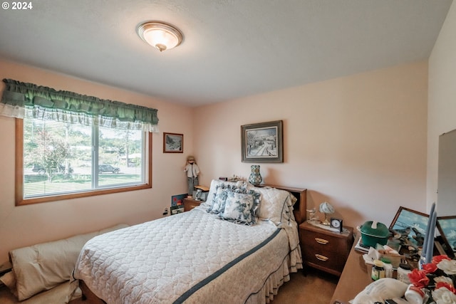 bedroom featuring carpet