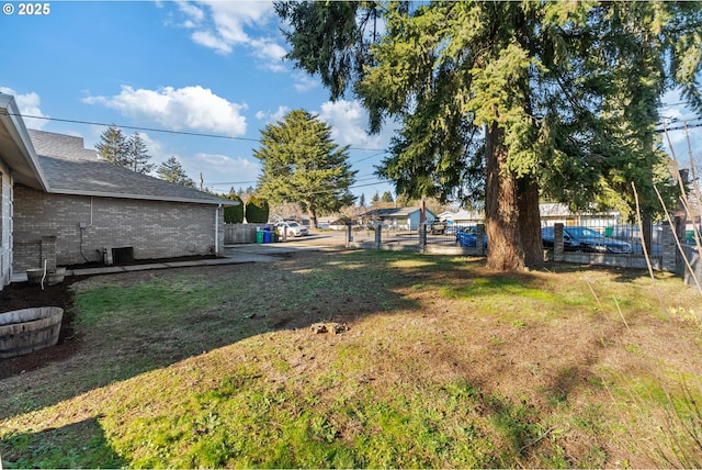 view of yard with central AC unit