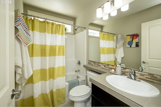 3050 SE 50th Ave Unit 6, Portland, OR 97206 - bathroom featuring backsplash, vanity, shower / bath combo, and toilet