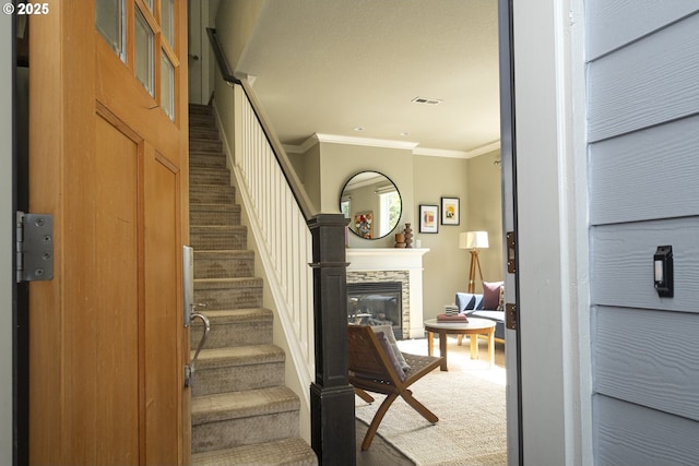 3050 SE 50th Ave Unit 6, Portland, OR 97206 - staircase with crown molding and a glass covered fireplace