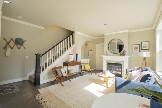 3050 SE 50th Ave Unit 6, Portland, OR 97206 - living room with stairs, ornamental molding, wood finished floors, a stone fireplace, and baseboards