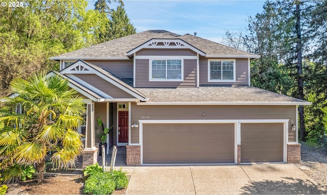 20160 SW 58th Ter, Tualatin, OR 97062 - craftsman-style home with brick siding, a garage, roof with shingles, and concrete driveway