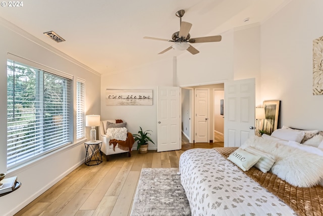 20160 SW 58th Ter, Tualatin, OR 97062 - bedroom featuring visible vents, crown molding, lofted ceiling, baseboards, and light wood-style flooring