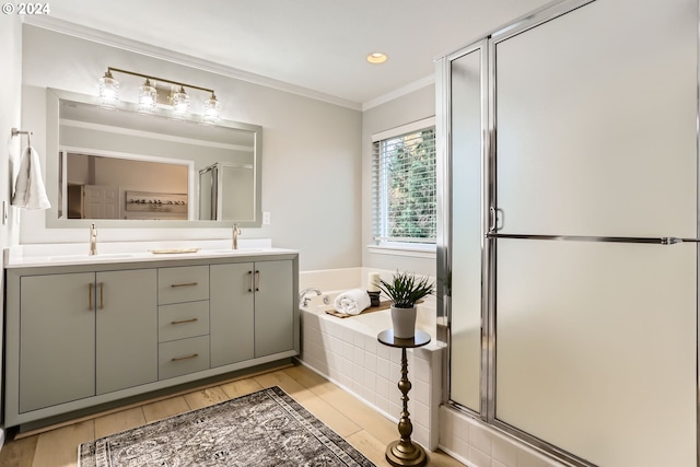 20160 SW 58th Ter, Tualatin, OR 97062 - full bath featuring a sink, double vanity, ornamental molding, a garden tub, and a stall shower