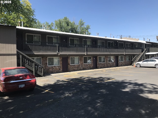 414 SE 17th St, Pendleton, OR 97801 - view of property with stairway and uncovered parking