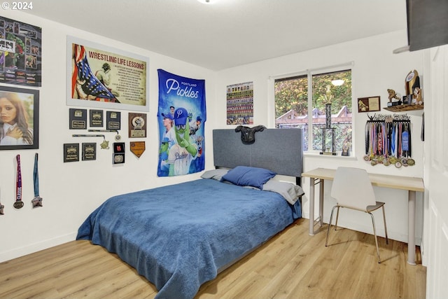 19500 S Rockie Dr, Mulino, OR 97042 - bedroom featuring wood finished floors and baseboards