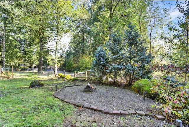 19500 S Rockie Dr, Mulino, OR 97042 - view of yard featuring an outdoor fire pit