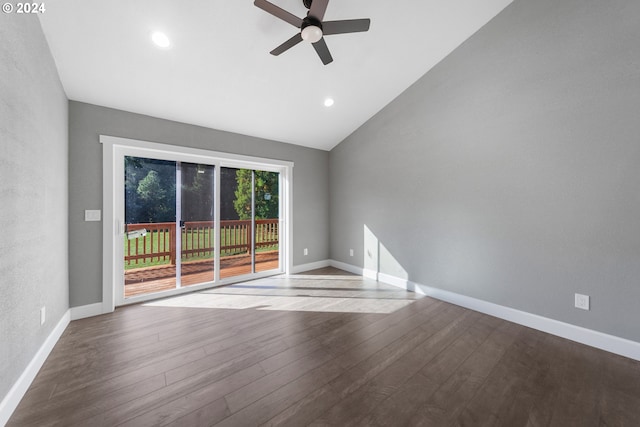 empty room featuring vaulted ceiling, wood-type flooring, and ceiling fan