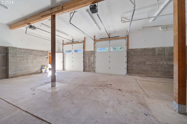 garage featuring a garage door opener