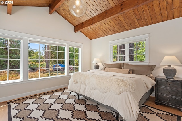 bedroom featuring light hardwood / wood-style flooring, wooden ceiling, and lofted ceiling with beams