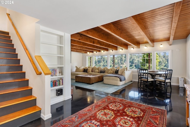 living room featuring built in features, beam ceiling, and wood ceiling