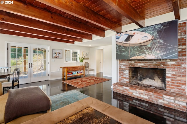 living room featuring wood ceiling, french doors, beamed ceiling, a fireplace, and concrete flooring