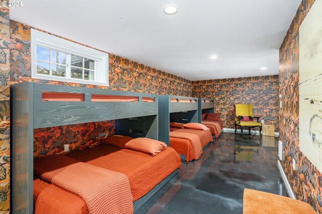 bedroom with concrete flooring