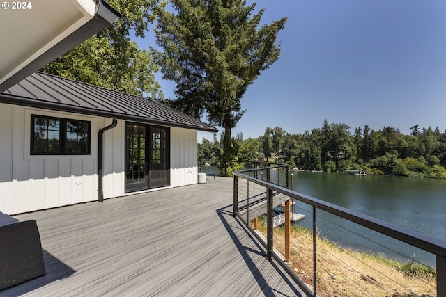 deck featuring a water view