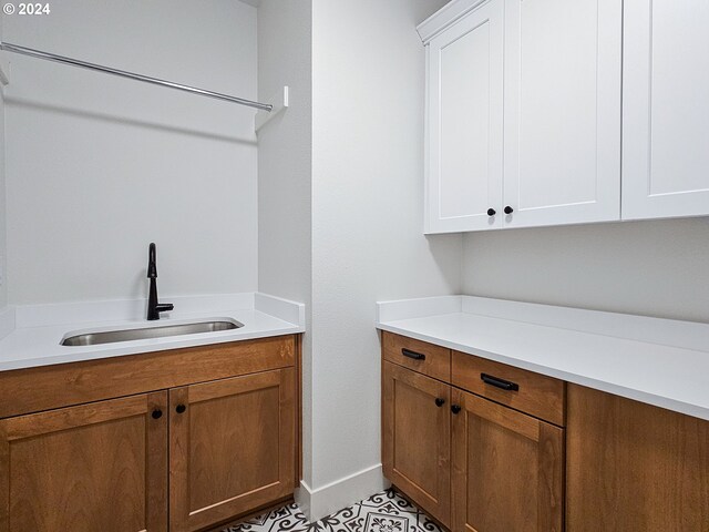 laundry area featuring sink