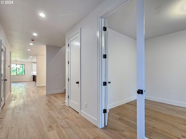 hall featuring light hardwood / wood-style flooring