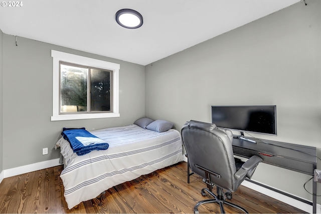 bedroom featuring hardwood / wood-style flooring