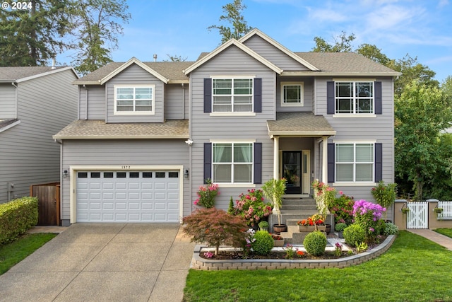 view of front of property with a garage