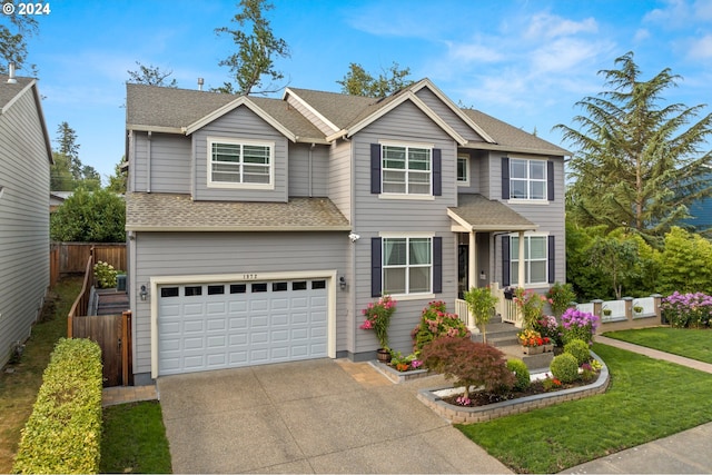 view of front of property featuring a garage