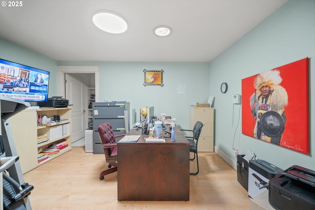 home office featuring light wood-type flooring