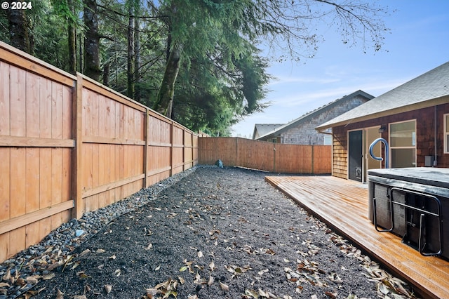 view of yard with a wooden deck