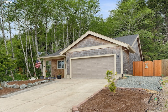 ranch-style house featuring a garage