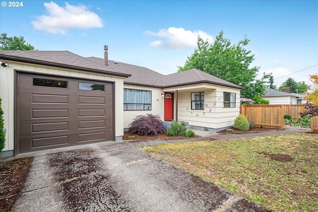 single story home with a garage