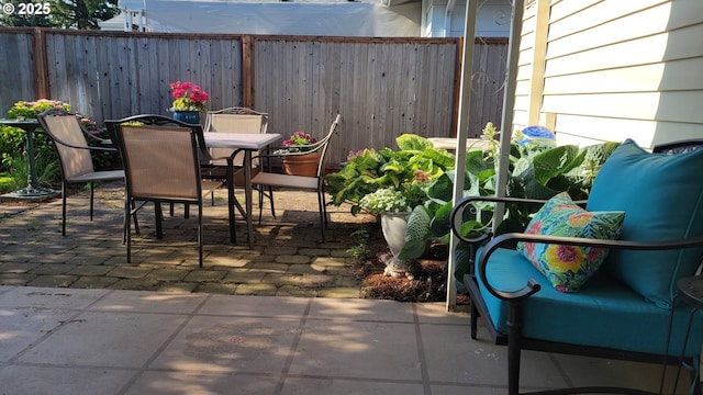 1499 Walton Way, Woodburn, OR 97071 - fenced backyard with a patio and outdoor dining area