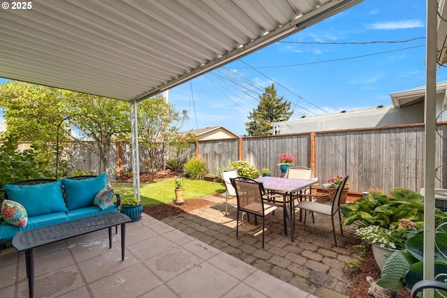 1499 Walton Way, Woodburn, OR 97071 - fenced backyard with outdoor dining area, a patio, and an outdoor living space