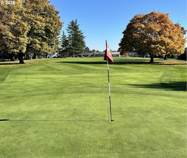 1499 Walton Way, Woodburn, OR 97071 - view of community featuring golf course view and a lawn