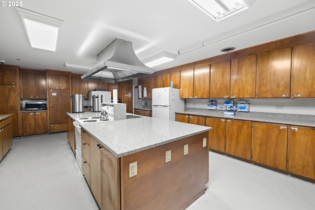 1499 Walton Way, Woodburn, OR 97071 - kitchen featuring white appliances, island range hood, brown cabinetry, a large island with sink, and light flooring