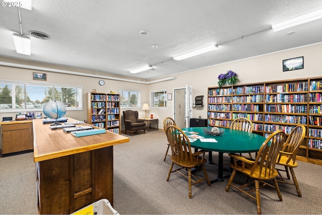 1499 Walton Way, Woodburn, OR 97071 - office with light carpet, a textured ceiling, and bookshelves