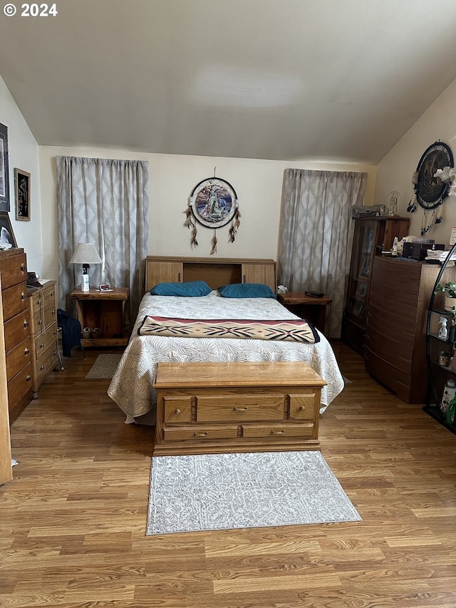 bedroom featuring light wood-type flooring